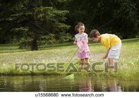 Children with fishing nets View Large Photo Image Stock Image - Children with fishing nets. Fotosearch