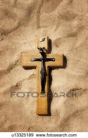 Christian cross on sand View Large Photo Image Stock Photo - Christian cross on sand. Fotosearch
