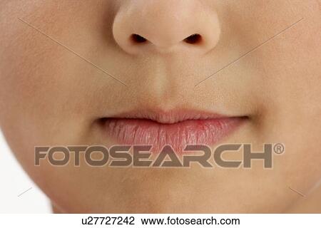 Stock Image - Closeup of child's lips . Fotosearch