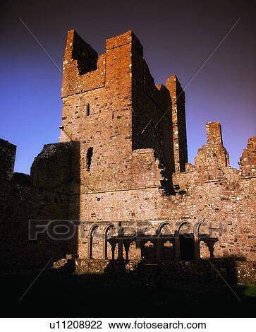Stock Image - Co Westmeath - Fore, Arcaded Cloisters in 13th Century Benedictine Abbey, Ireland. Fotosearch
