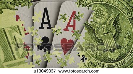 Stock Photo - Composite of a US dollar bill and playing cards. Fotosearch
