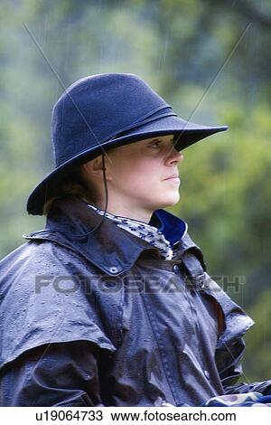 Cowgirl in the rain View Large Photo Image Stock Image - Cowgirl in the rain . Fotosearch