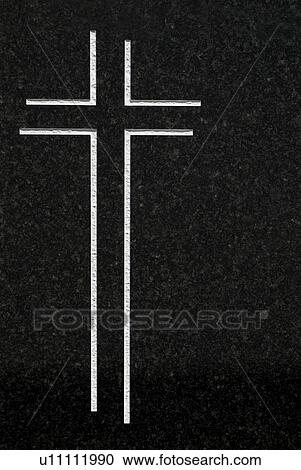 Stock Image - Cross carved on granite. Fotosearch