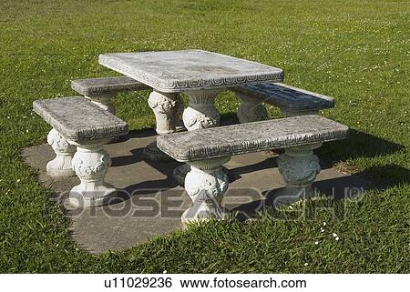 Stock Photograph - Decorative outdoor table and chairs . Fotosearch