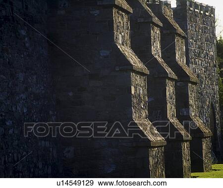Stock Photo - Dublin, Buttresses on preserved section of City Wall, Cook Street, Ireland. Fotosearch