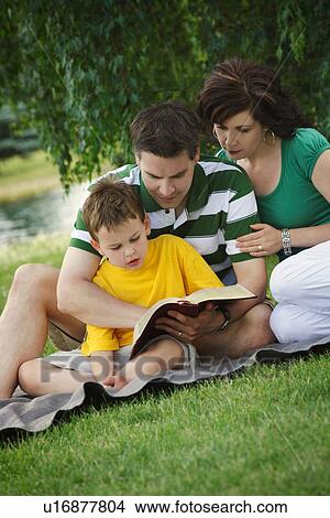 Family reading together View Large Photo Image Picture - Family reading together. Fotosearch