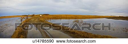 Stock Image - Flooded fields after rainfall. Fotosearch
