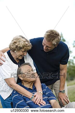 Front view of a happy family View Large Photo Image Stock Image - Front view of a happy family. Fotosearch