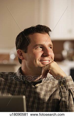 Front view of a man smiling View Large Photo Image Stock Image - Front view of a man smiling. Fotosearch