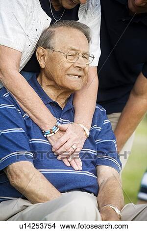 Picture - Front view of senior man sitting. Fotosearch