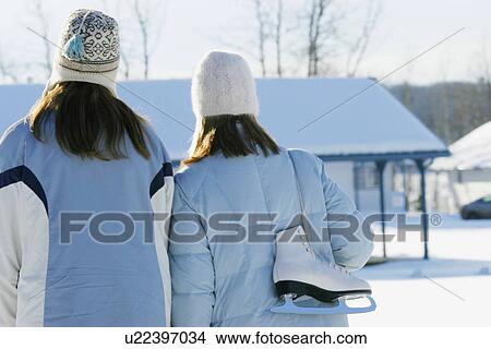 Girls wearing winter clothing View Large Photo Image Picture - Girls wearing winter clothing. Fotosearch
