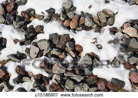 Stock Photo - Gravel and snow. Fotosearch