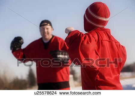 Picture - Ice hockey players fighting. Fotosearch