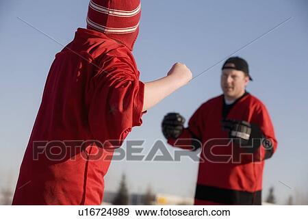 Ice hockey players fighting View Large Photo Image Stock Photo - Ice hockey players fighting. Fotosearch