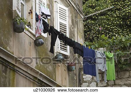 Stock Photograph - Laundry hanging from a line, Dubrovnik, Croatia. Fotosearch