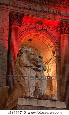 Stock Image - Lion statue at New York Public Library, Midtown Manhattan, New York City, New York, USA . Fotosearch