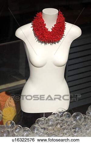 Stock Photograph - Mannequin in store window with bubbles. Fotosearch