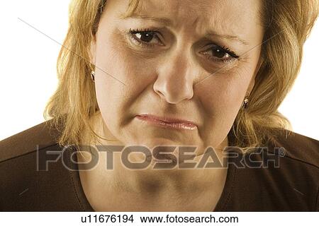 Middle aged woman looking sad View Large Photo Image Picture - Middle aged woman looking sad. Fotosearch