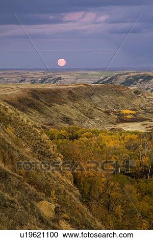 Moonrise in the badlands of Alberta, Canada View Large Photo Image Stock Image - Moonrise in the badlands of Alberta, Canada . Fotosearch