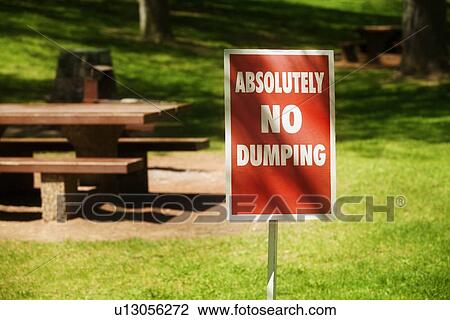 No dumping sign in the park View Large Photo Image Stock Image - No dumping sign in the park. Fotosearch