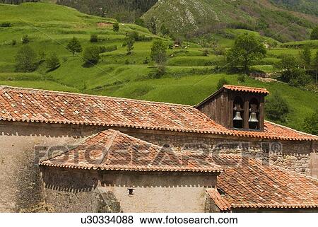 Pantiled roofs and church belfry in Carmona, Cantabria, Northern Spain View Large Photo Image Stock Photo - Pantiled roofs and church belfry in Carmona, Cantabria, Northern Spain . Fotosearch