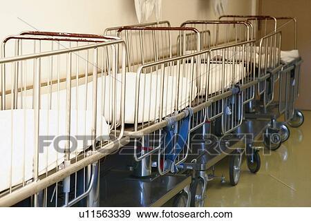 Stock Photo - Pediatric hospital stretchers in hallway. Fotosearch