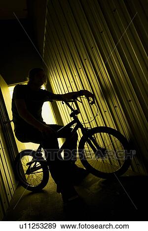 Person on a bike in a trailer View Large Photo Image Stock Photo - Person on a bike in a trailer. Fotosearch
