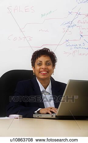 Stock Photo - Portrait of a businesswoman . Fotosearch
