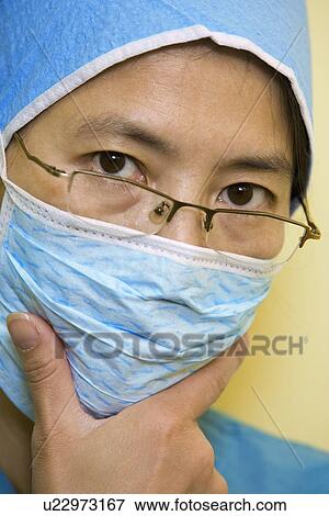 Portrait of surgeon thinking View Large Photo Image Stock Photo - Portrait of surgeon thinking. Fotosearch
