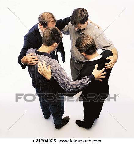 Praying together View Large Photo Image Stock Photography - Praying together. Fotosearch