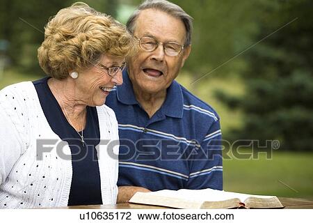 Stock Image - Senior couple laughing. Fotosearch