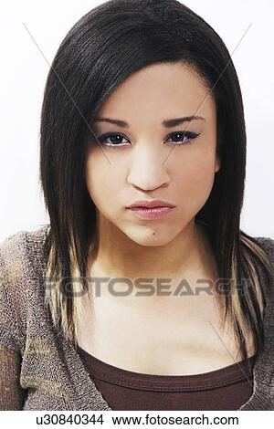Picture - Serious teenager girl. Fotosearch