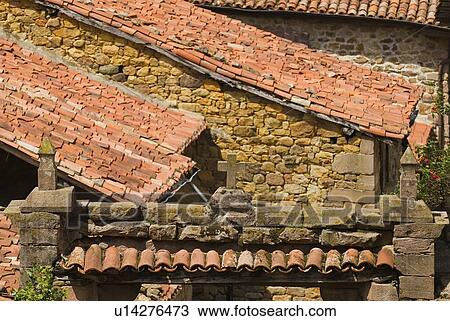Stone cross on lintel with pantiled roofs, Carmona, Cantabria, Northern Spain View Large Photo Image Stock Image - Stone cross on lintel with pantiled roofs, Carmona, Cantabria, Northern Spain. Fotosearch