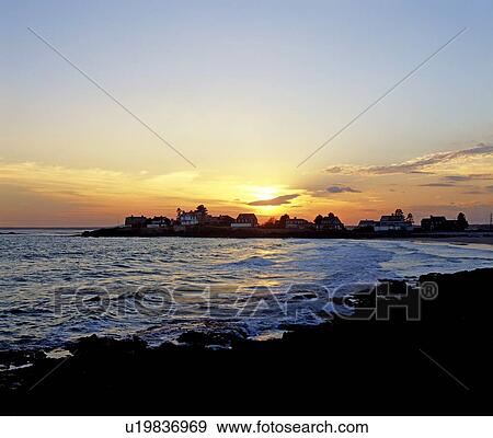 Stock Photo - Sunrise on the coast. Fotosearch