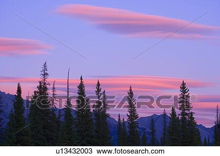 Sunset and clouds, Banff National Park, Alberta, Canada View Large Photo Image Stock Image - Sunset and clouds, Banff National Park, Alberta, Canada. Fotosearch