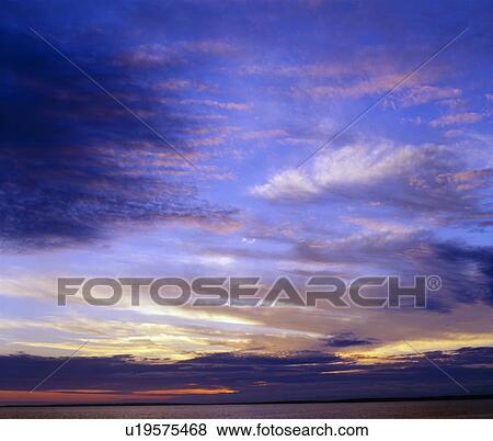 Sunset skies View Large Photo Image Stock Photo - Sunset skies. Fotosearch