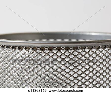 Top of mesh metal pencil holder View Large Photo Image Stock Photograph - Top of mesh metal pencil holder. Fotosearch