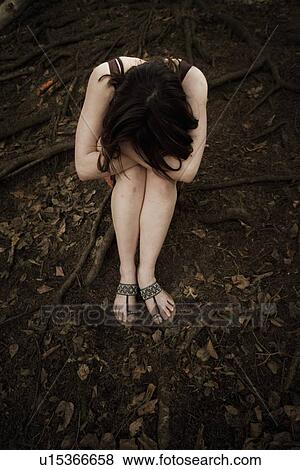 Troubled young woman View Large Photo Image Stock Photo - Troubled young woman. Fotosearch