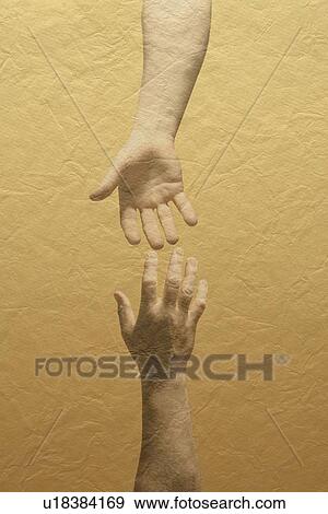 Two hands reaching with yellow wall View Large Photo Image Stock Photo - Two hands reaching with yellow wall. Fotosearch