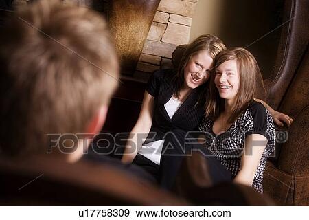 Stock Photo - Two young women smiling. Fotosearch