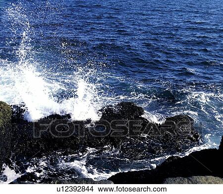Waves crashing on rocks View Large Photo Image Picture - Waves crashing on rocks. Fotosearch