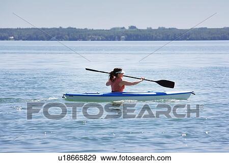 Woman kayaking View Large Photo Image Stock Photo - Woman kayaking. Fotosearch