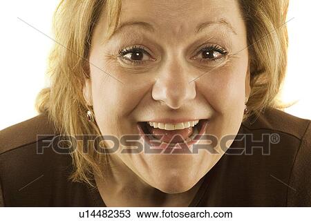 Stock Image - Woman making silly face. Fotosearch