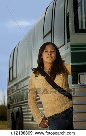 Stock Photo - Woman on a bus. Fotosearch