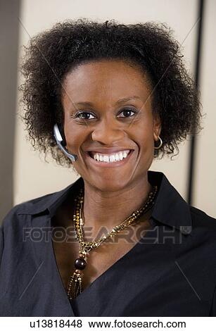 Stock Photo - Woman on wireless phone. Fotosearch