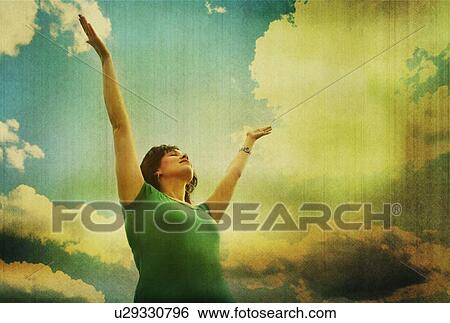 Woman with arms raised View Large Photo Image Stock Photograph - Woman with arms raised. Fotosearch