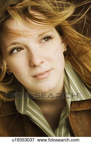 Woman with blowing hair View Large Photo Image Stock Photo - Woman with blowing hair. Fotosearch