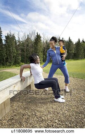 Stock Photography - Women exercising together. Fotosearch