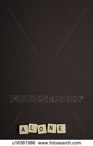 Stock Photograph - Word tiles on black background. Fotosearch