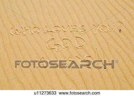 Writing in sand that states, "who loves you? GOD, always" View Large Photo Image Stock Image - Writing in sand that states, "who loves you? GOD, always". Fotosearch